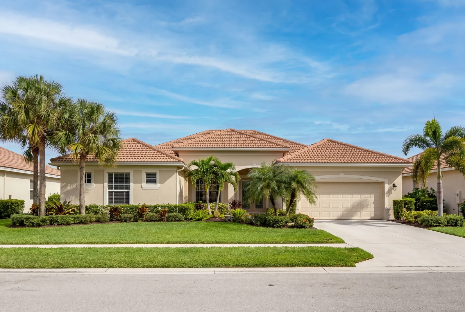 The same house with the gray sky replaced by blue