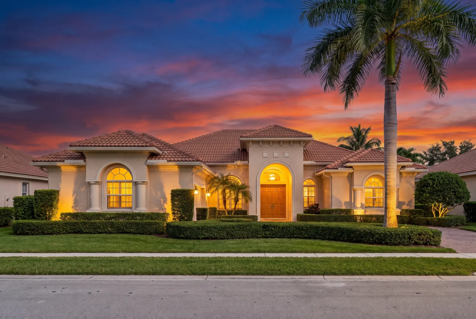 The same tile-roof house at twilight