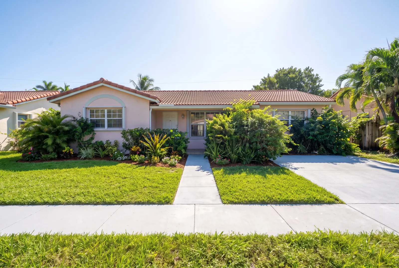 The same house with tidy landscaping