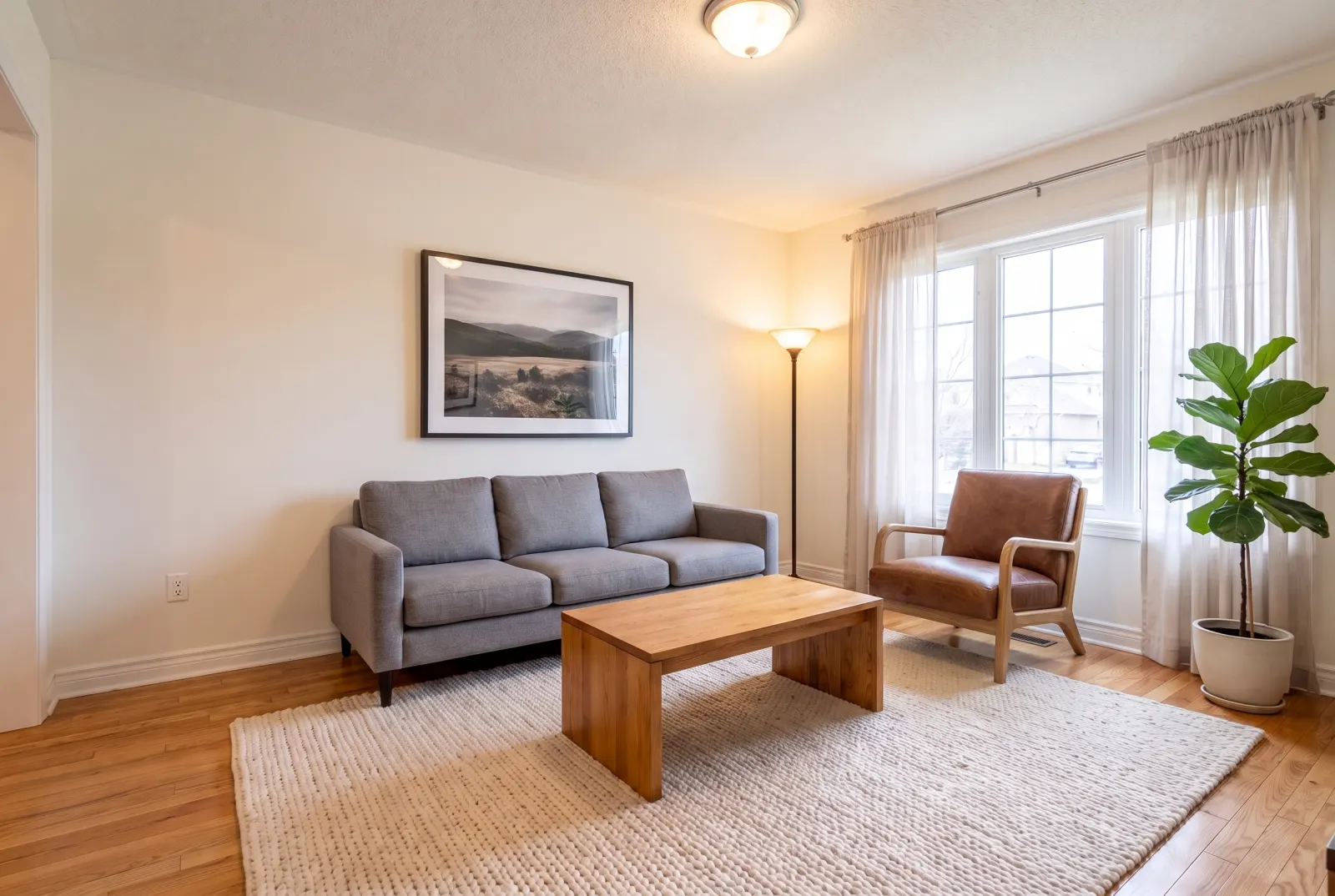 The same room with a cognac leather armchair
