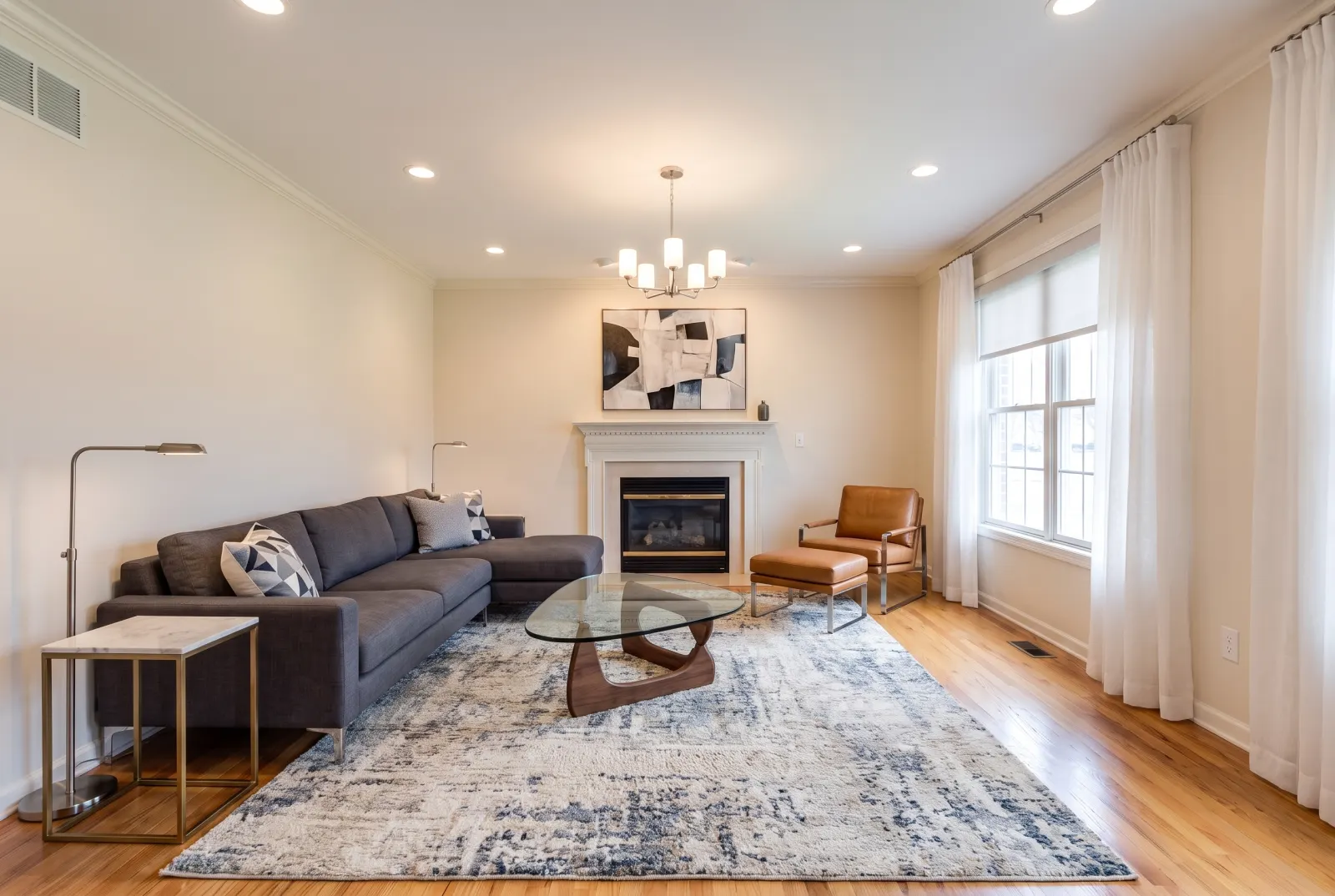 The same living room restyled as modern